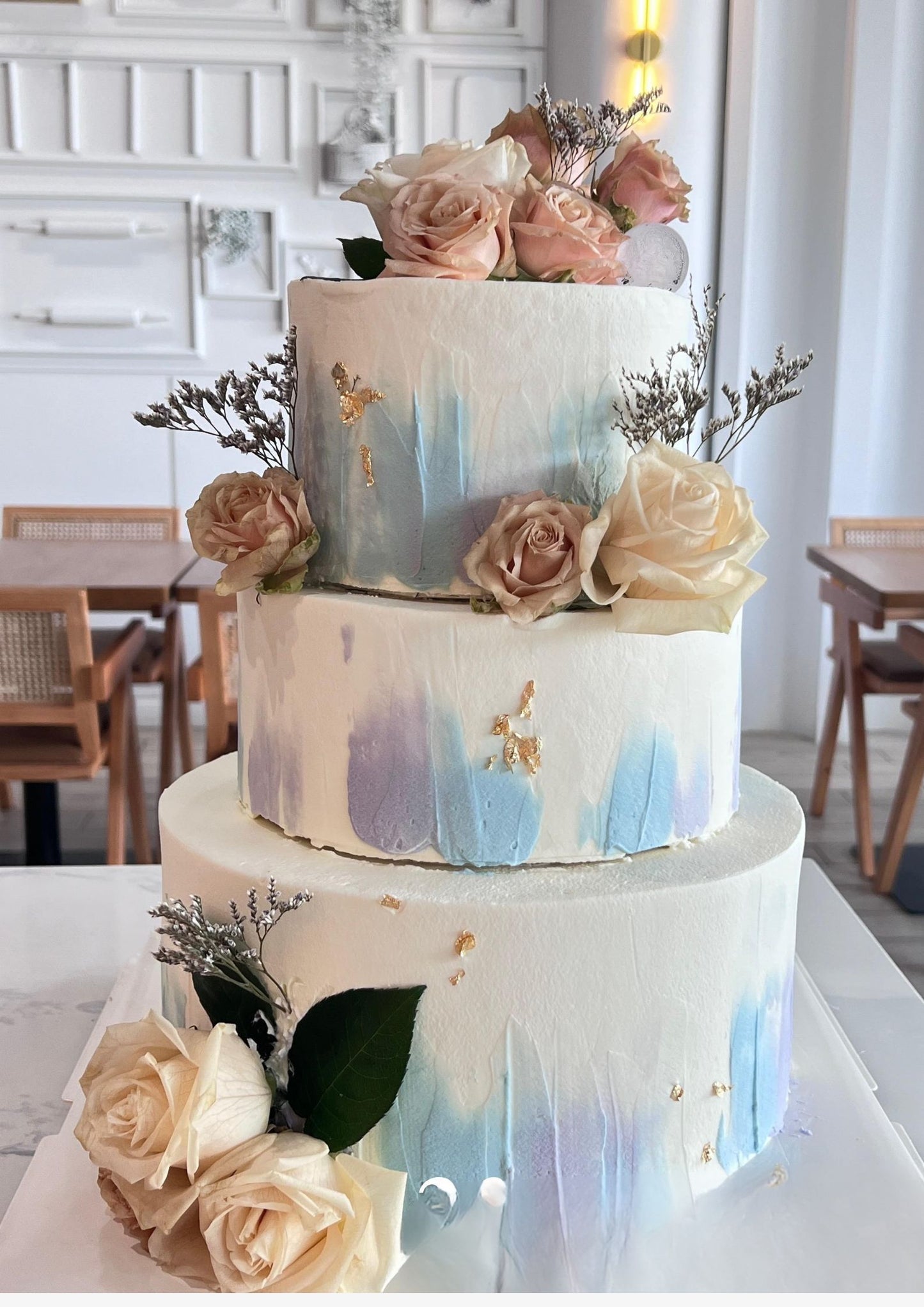 Light blue and purple wedding cake