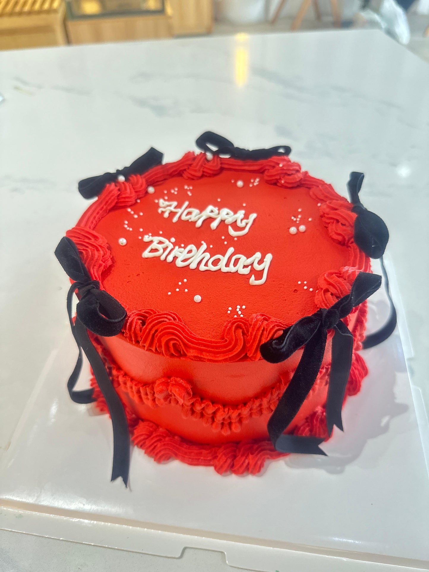 Black Ribbon Red Cake